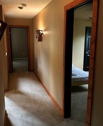 Hallway on main level with two bedrooms....far room with acc