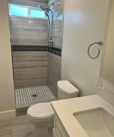 Bathroom #1 with all new shower, vanity, mirrors and toilet