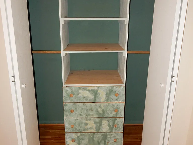 Bedroom 2 custom-built in shelves/drawers in closet