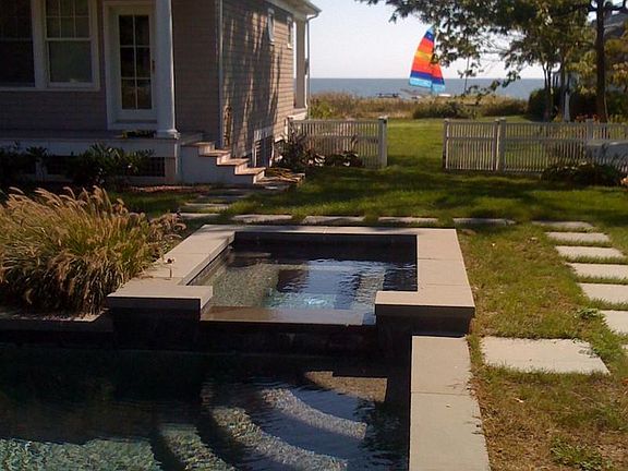 Pool and hot tub with water view