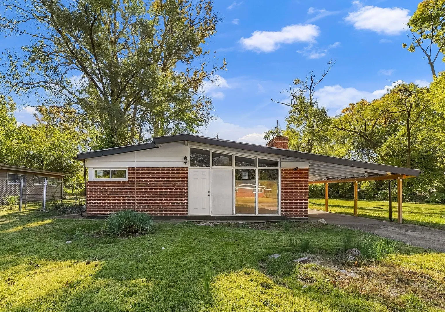 3-Bedroom Home with Carport & Spacious Yard | 8448 Bayberry Dr — Photo 1