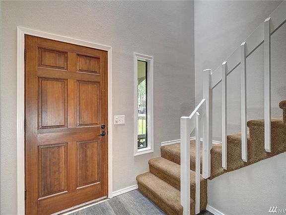 Welcome your guests in the open two story foyer. 