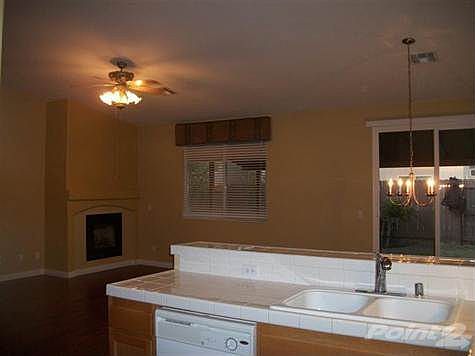 open floor with living room and dining area.  fireplce at living room area.