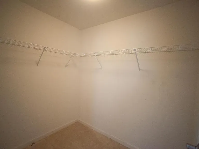 Master bedroom walk in closet
