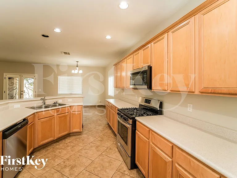 7776 W Thelon Ct — Photo 6