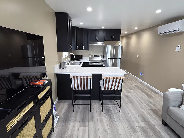 Vinyl flooring throughout the unit