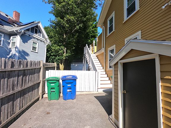 Entry on side of house. Leads up to back deck.