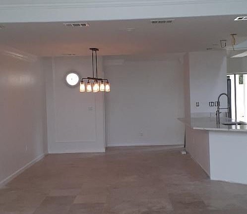 loft overlooking the front entrance and 
 to the kitchen area from the other side