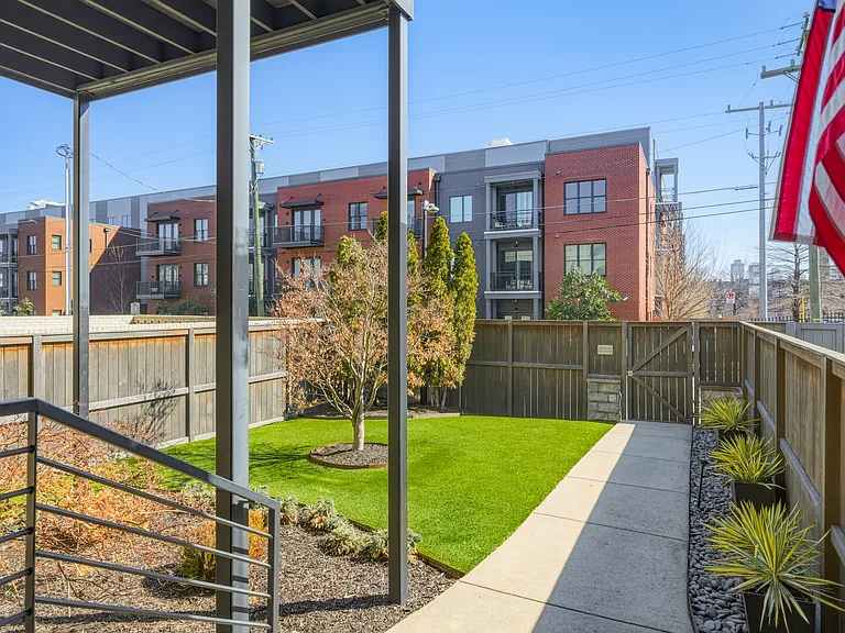 Private Balcony attached to the Master Bedroom with cozy outdoor seating. Views of downtown!