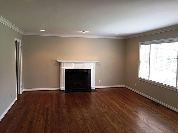 Living room (adjacent to dining room / off front door entrance)