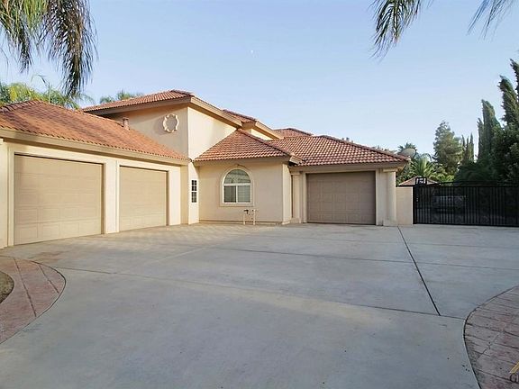 Three car garages/driveway 