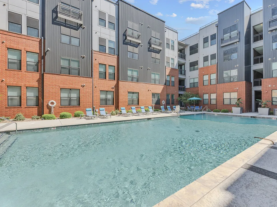 Resort Style swimming pool with lounge chairs