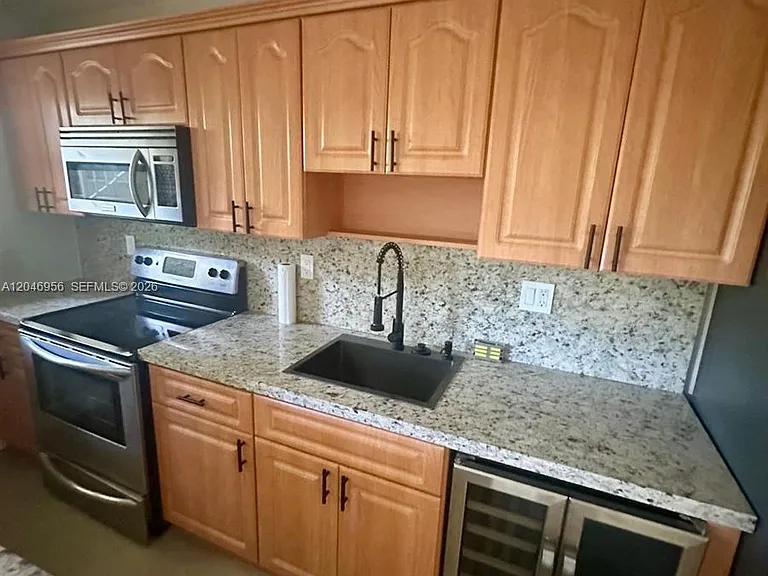 5839 SW 74th Ter #104 — Photo 11