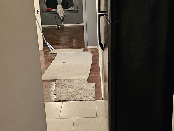 Leaving the bedroom towards the kitchen. Facing east