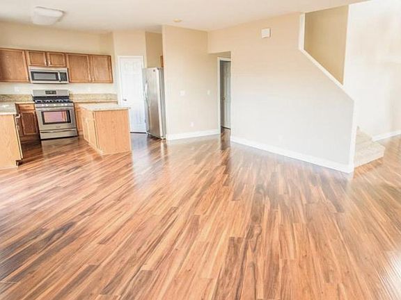 Spacious living room area off of kitchen.