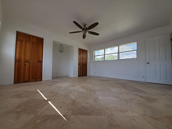 Extremely spacious upstairs bedroom has windows on both sides