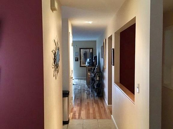 First floor hallway, living room at the end.