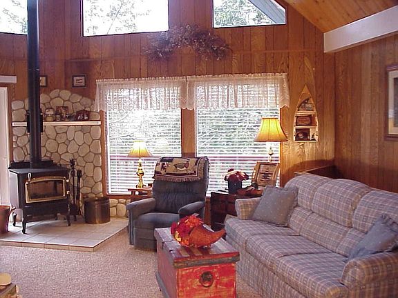 Great Room features this cozy wood stove