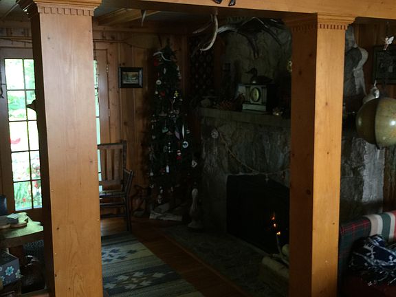 Den w/ historic stone firepl