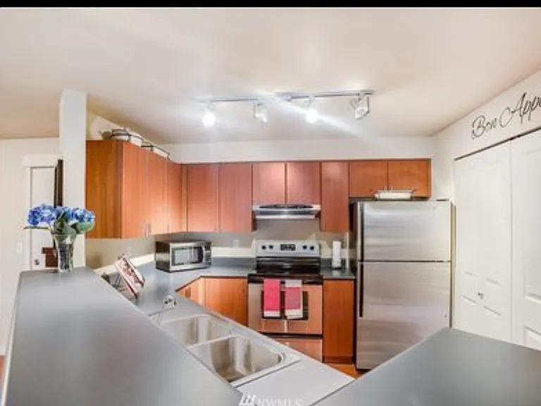 7711 NE 175th St #C304 — Photo 10
