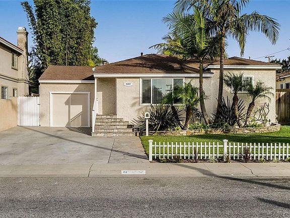 Lovely Curb Appeal with Lush Landscaping and Lots of Parking