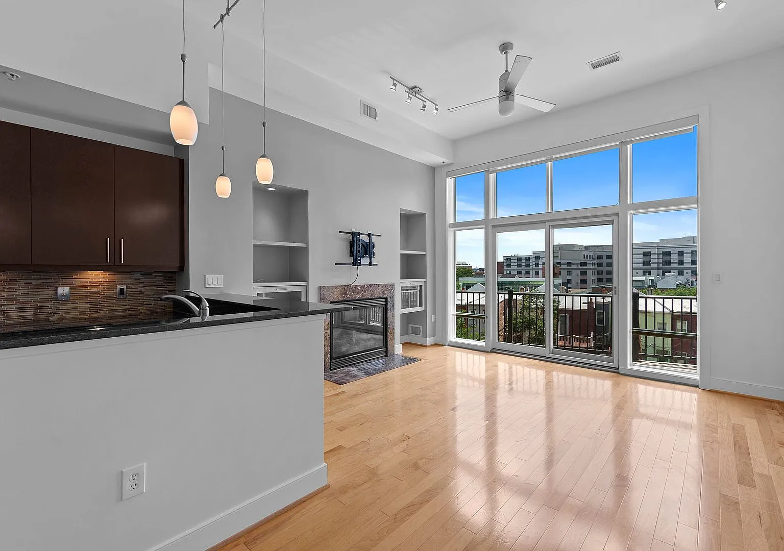 U St Corridor Stunning 1BR+Den Corner Condo w/City Views & Parking Available — Photo 1