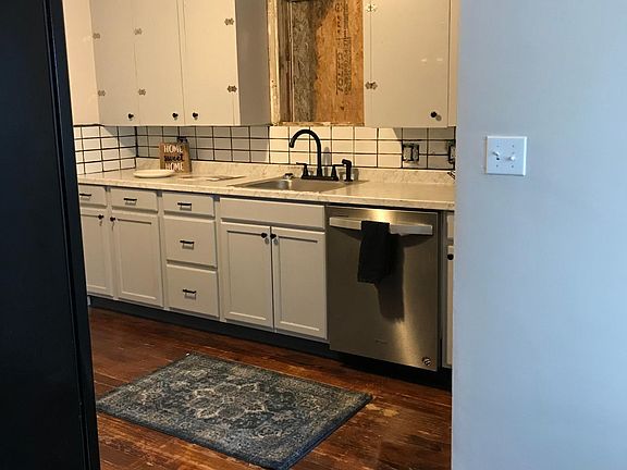 Kitchen - new cabinets and dishwasher -window install asap