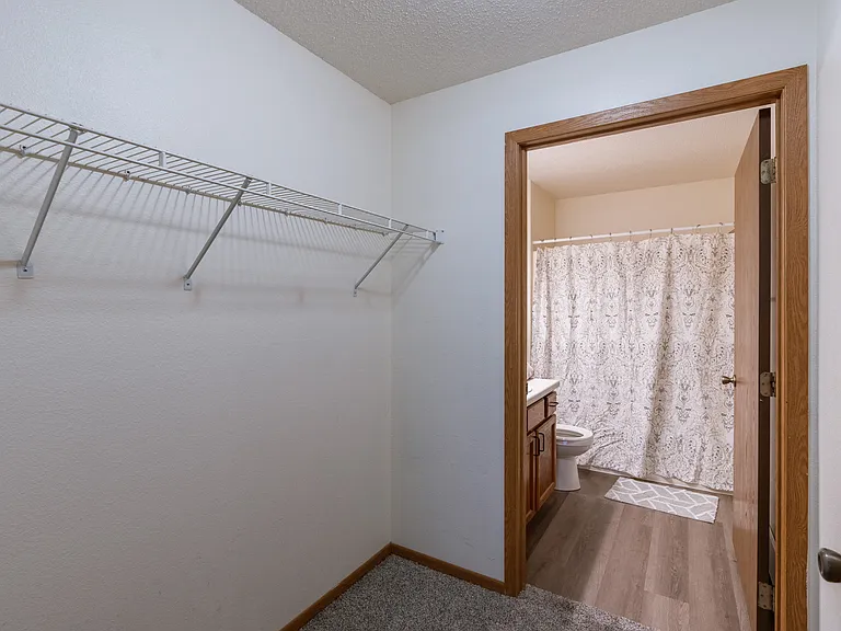 Fargo, ND Willow Park Apartments | Bathroom and closet