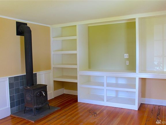 Built-ins for all the tv, collectibles, and books.  Stay warm and toasty by the fire on cold winter nights. 