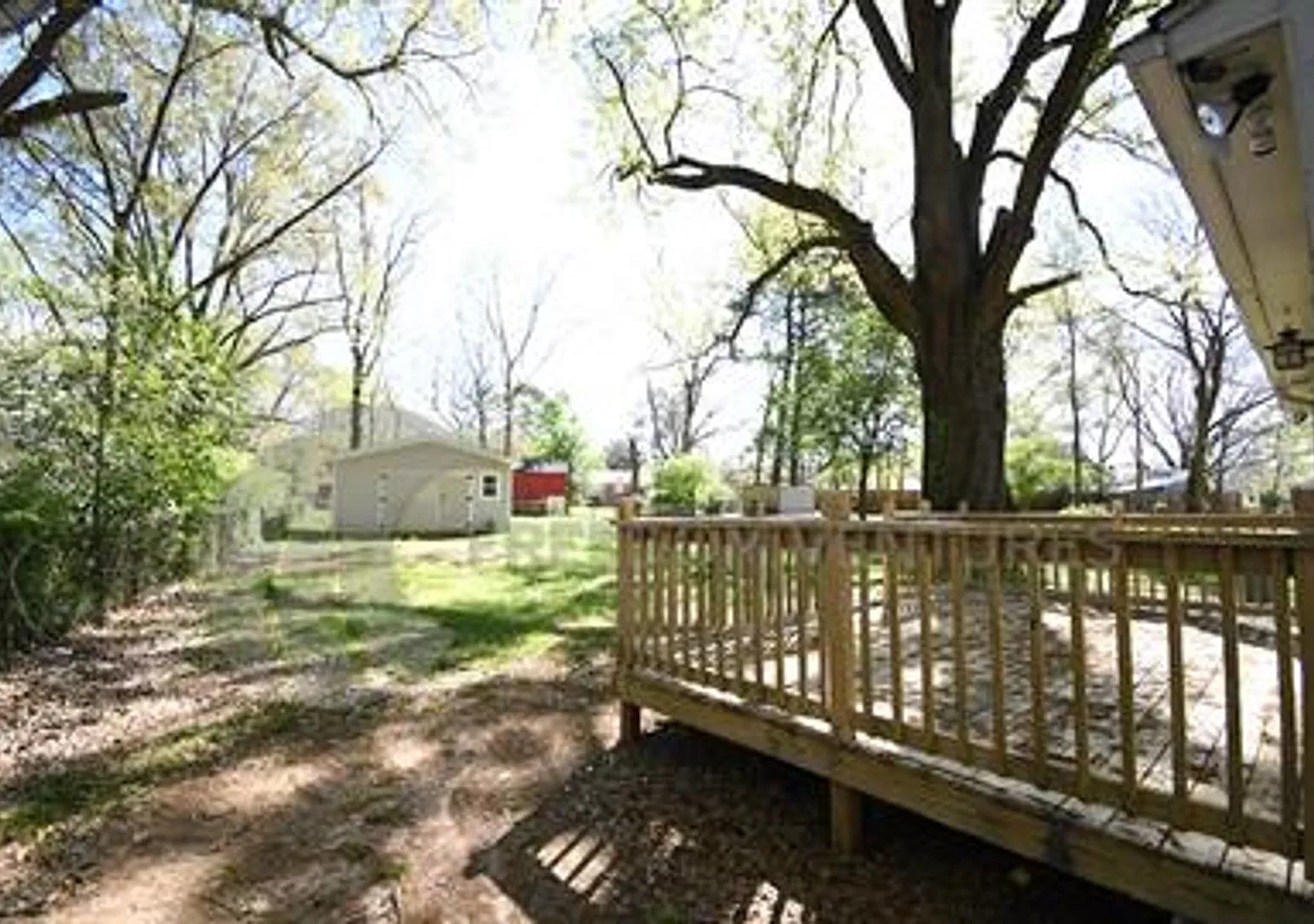 Comfortable 3-Bedroom Home with Deck & Backyard — Photo 3