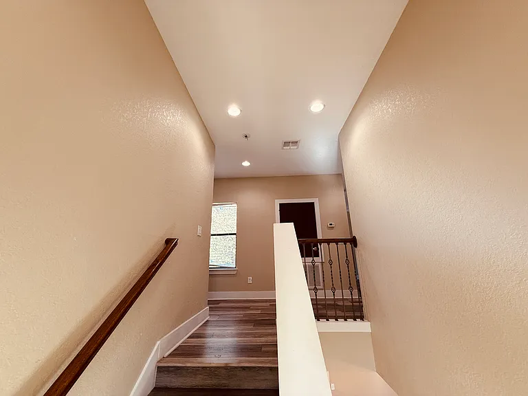 Laminate Flooring throughout second floor and Stairs
