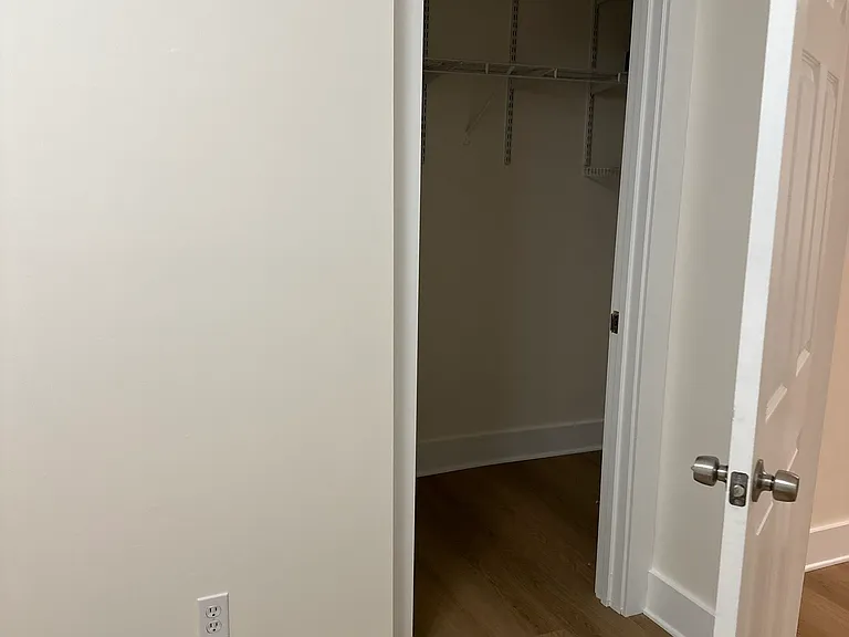 Walk in closet in secondary bedroom