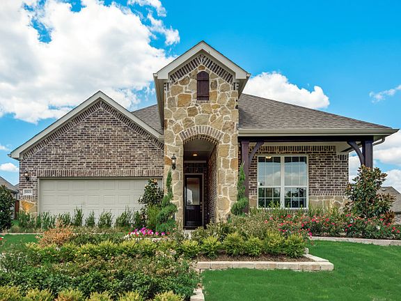 The Arlington, a one-story home with 2-car garage, shown with Home Exterior D