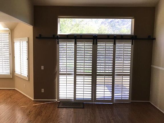 Barn door style plantation shutters