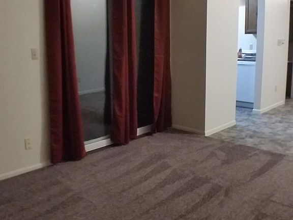 2 Bedroom, split level Living Room and Patio