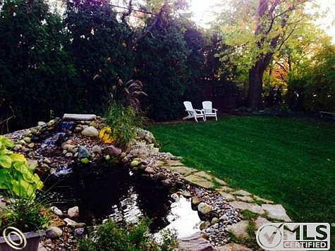 Koi Pond lined with Stones.JPG