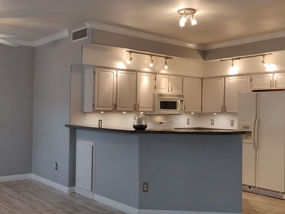 view into kitchen. Dimmable lighting, under cabinet task lighting.