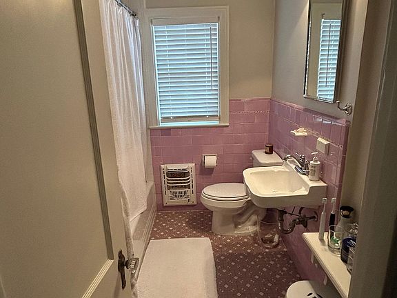 Bathroom with original tile and completely redone shower