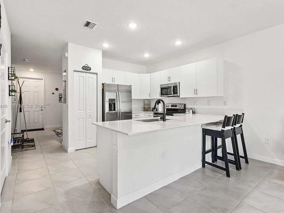 1st image of 11438 W 34th Ct #11438