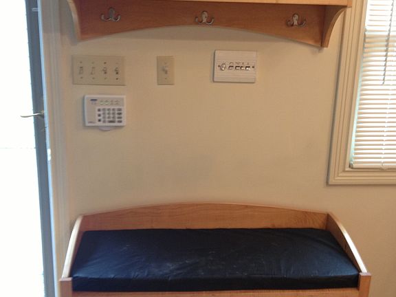 Welcome home!  Put your shoes, purse, brief case, and back pack here.