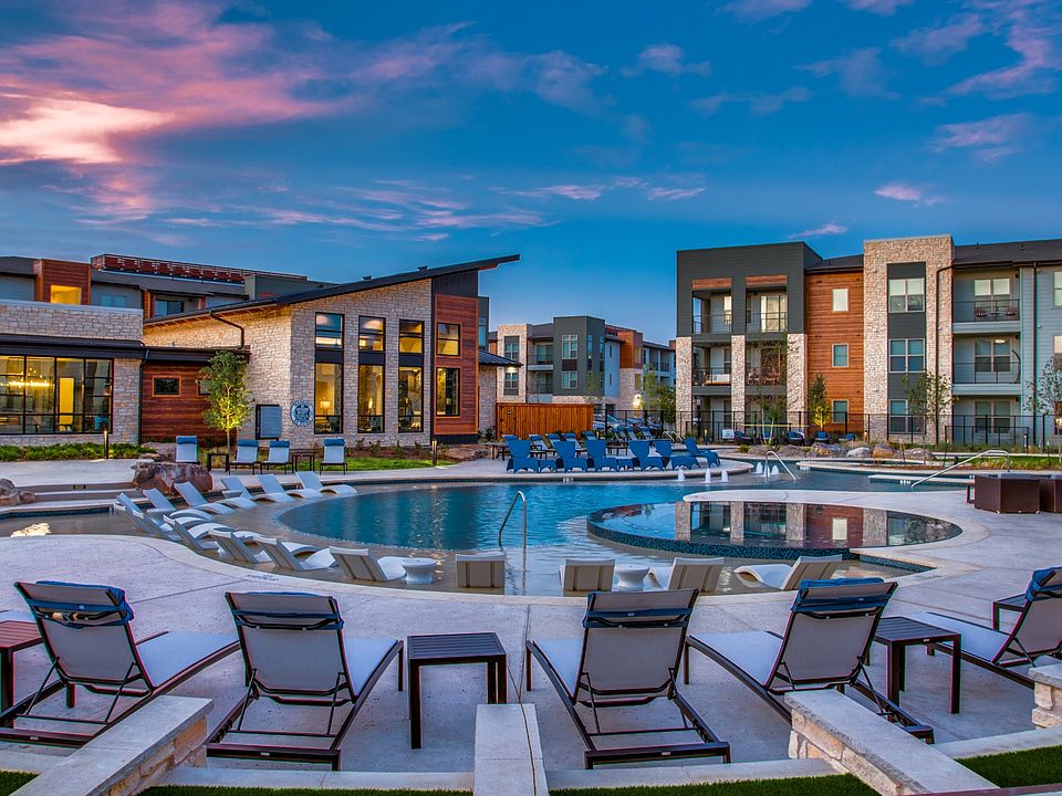 Aura 3FiftyOne Apartments Pool Area and Lounge Chairs