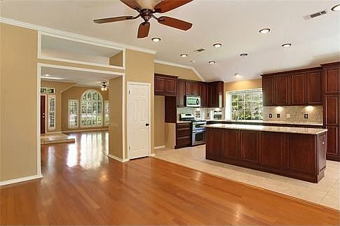 Kitchen with Isand opens to Den