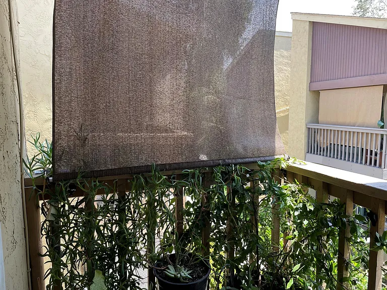 Feeling hot in July and August? Pull down the Coolaroo for some shade and keep the scorching heat away from the balcony.
