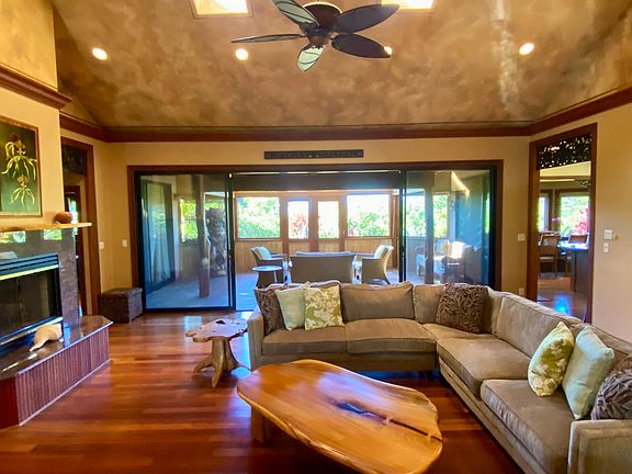 Living room and enclosed patio/lanai