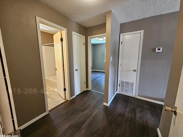 Hallway: bathroom, bedroom #3, storage closet, utility closet