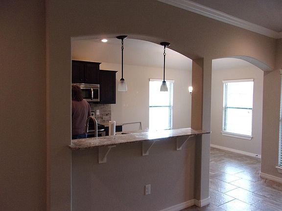 View from living room into dining/kitchen area
