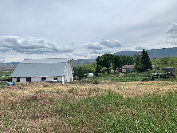 Old dairy barn towards house