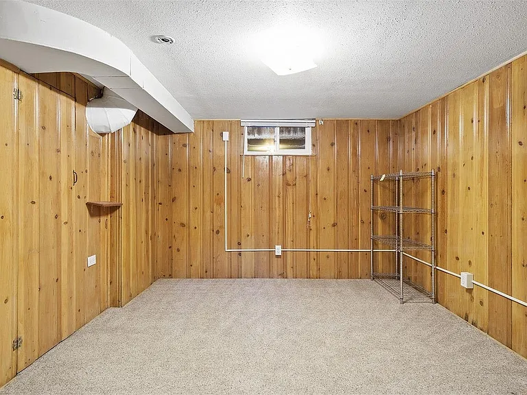 Downstairs bonus room, with separate locked entrance, can be used as an office, storage, etc.