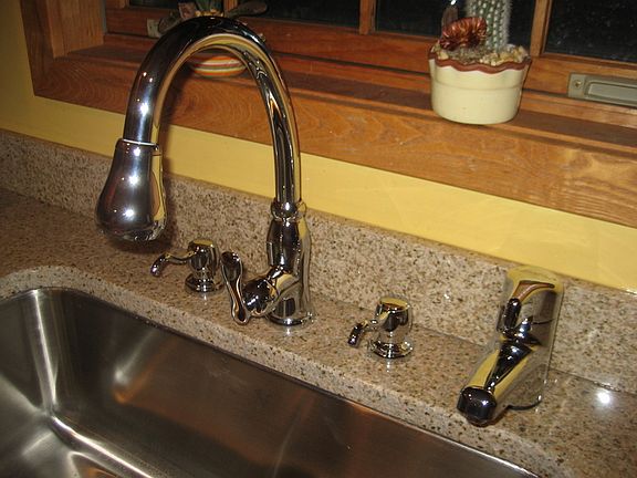 New granite counter with updated fixtures and instant hot water.