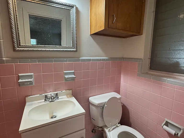 This bathroom is located inside of the master bedroom